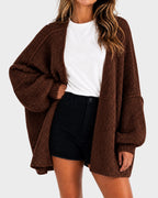Women's oversized textured knit cardigan with open front and lantern sleeves