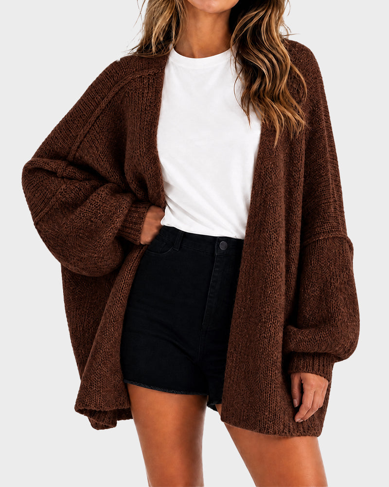 Women's oversized textured knit cardigan with open front and lantern sleeves