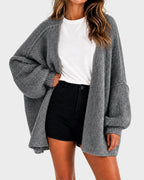 Women's oversized textured knit cardigan with open front and lantern sleeves