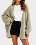 Women's oversized textured knit cardigan with open front and lantern sleeves