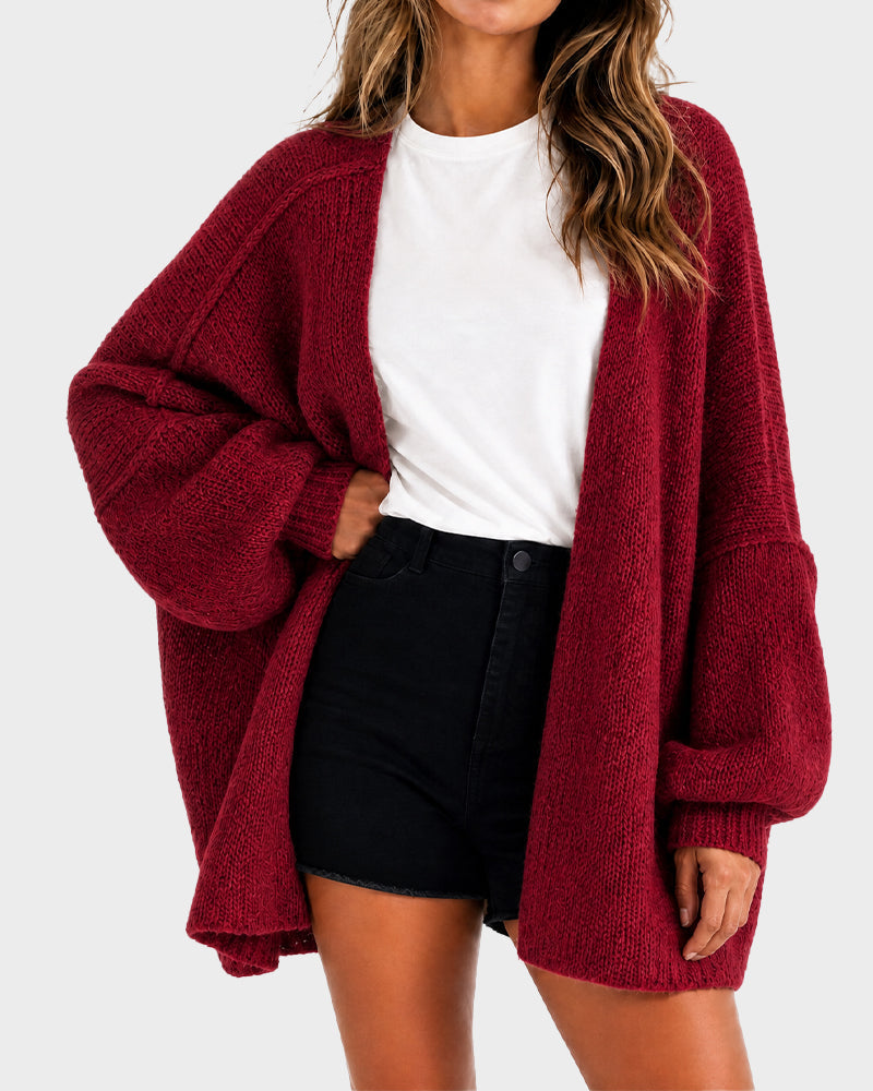 Women's oversized textured knit cardigan with open front and lantern sleeves