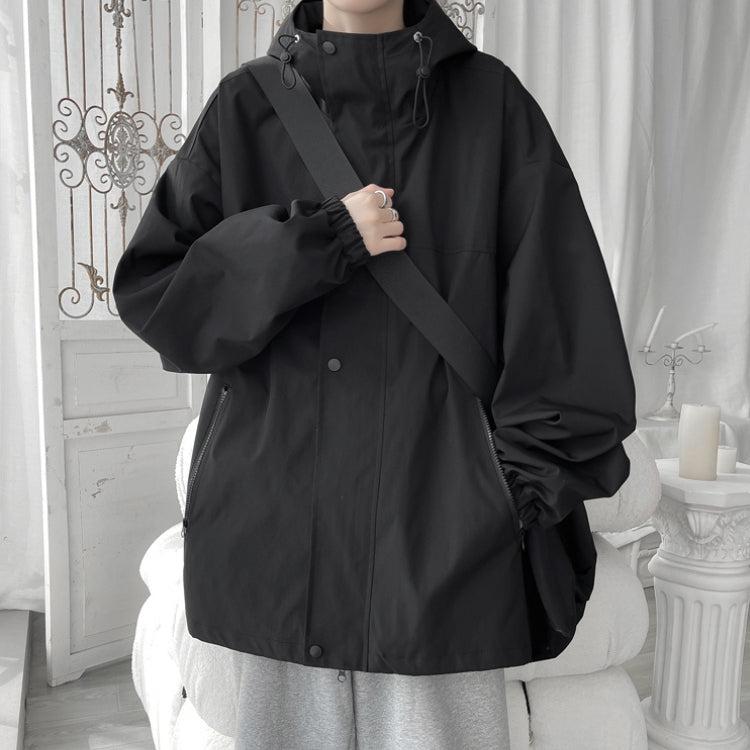 Women's oversized hooded windbreaker jacket with snap front and zip pockets