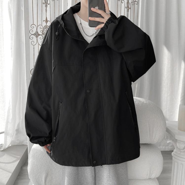 Women's oversized hooded windbreaker jacket with snap front and zip pockets