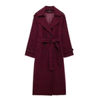 Women's burgundy double-breasted trench coat with belt and long sleeves