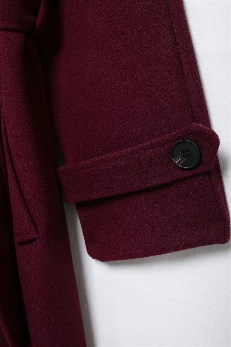 Women's burgundy double-breasted trench coat with belt and long sleeves