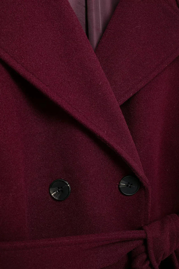 Women's burgundy double-breasted trench coat with belt and long sleeves