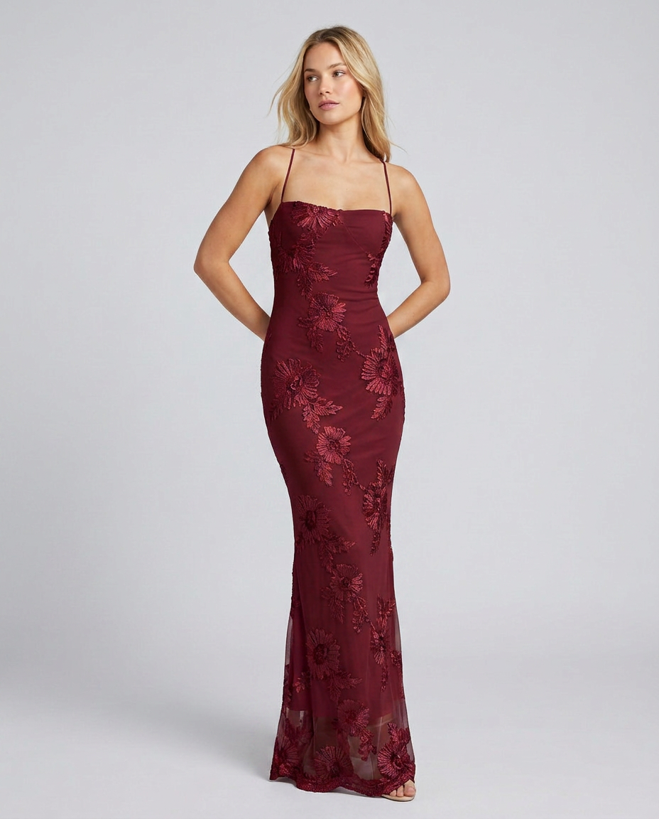 Women's fitted floral appliqué maxi dress with spaghetti straps and sheer hem