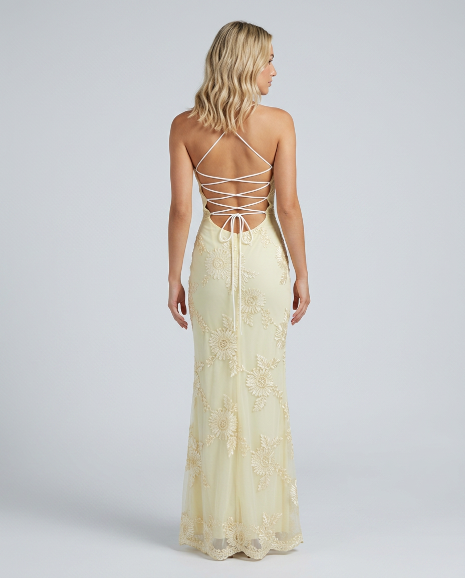 Women's fitted floral appliqué maxi dress with spaghetti straps and sheer hem