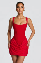 Women's sleeveless square-neck mini dress with a fitted bodice and draped ruched skirt