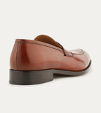 Men's brown polished penny loafer with almond toe and low heel