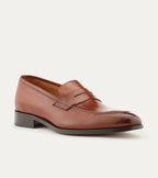 Men's brown polished penny loafer with almond toe and low heel