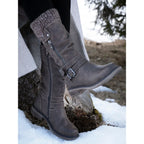Brown women's mid-calf boots with knitted cuff, side zip and buckle straps