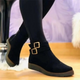Women's ankle boots with two buckle straps