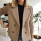 Women's button-front knit blazer with notched lapels and long ribbed sleeves