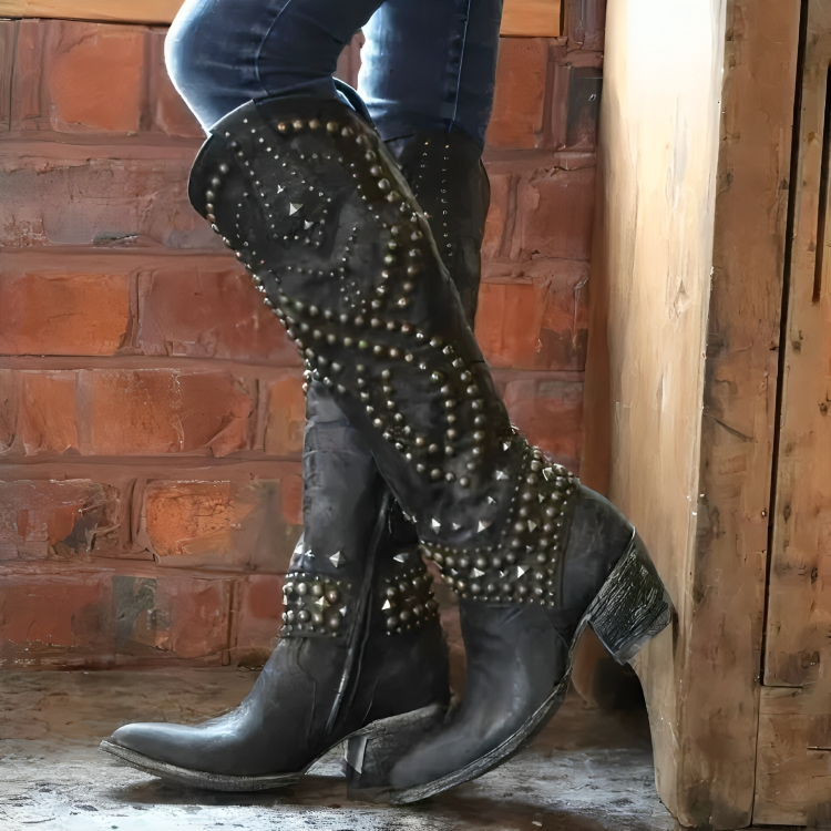 Women's studded knee-high western boots with pointed toes