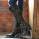 Women's studded knee-high western boots with pointed toes