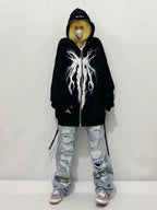 Women's black oversized zip hoodie with white abstract front graphic