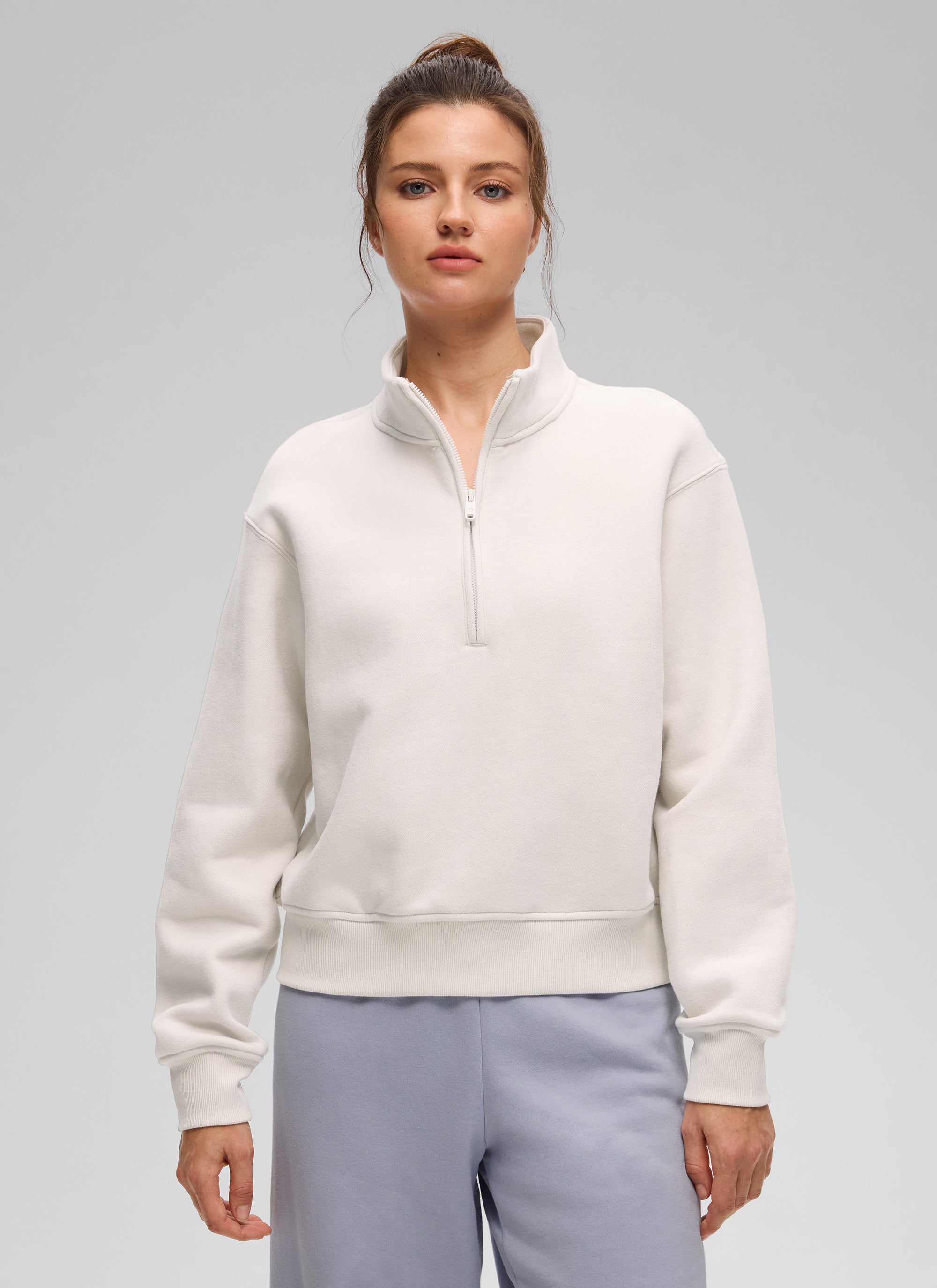 Women's funnel neck half-zip sweatshirt with long sleeves and ribbed trims
