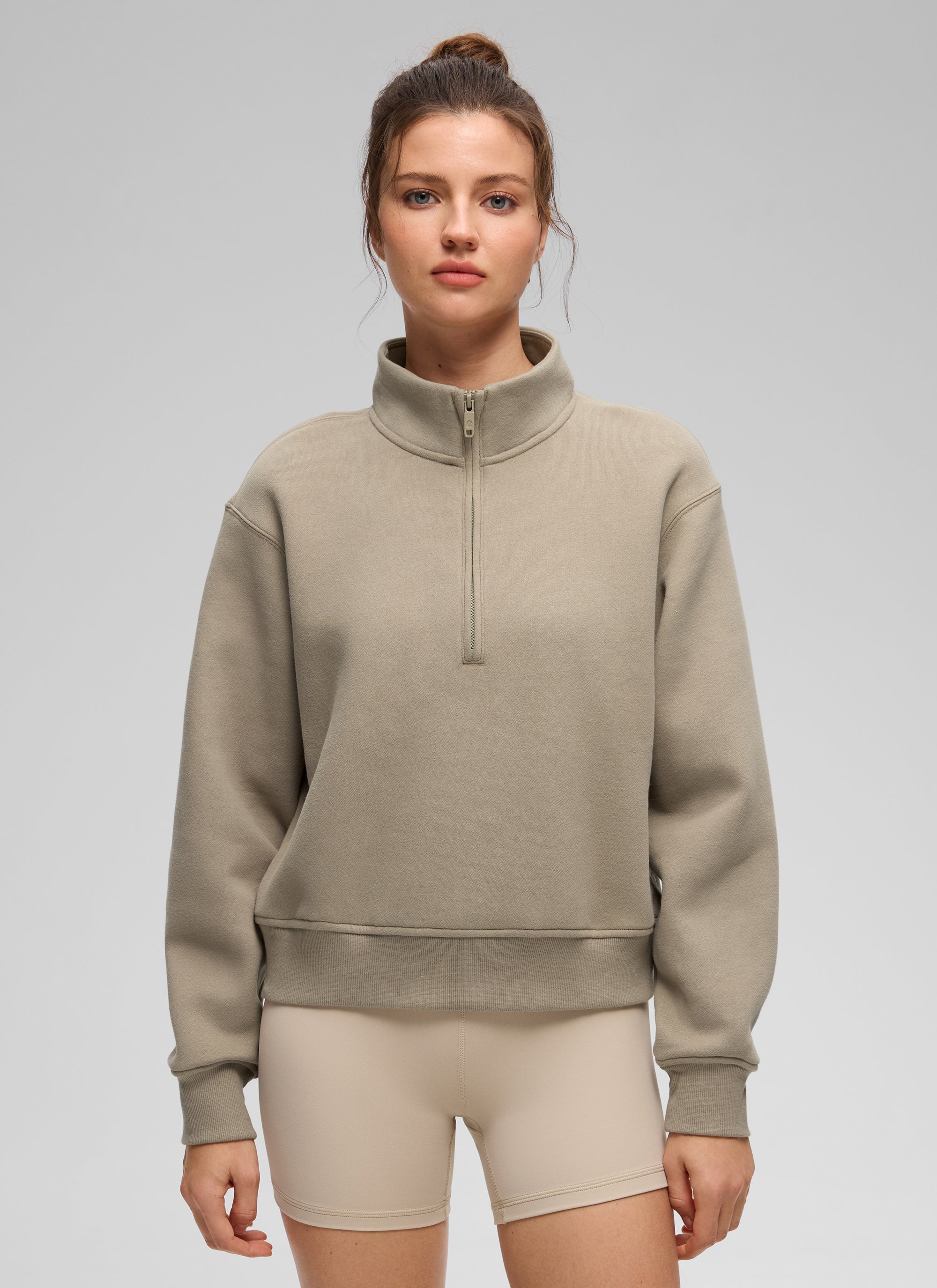 Women's funnel neck half-zip sweatshirt with long sleeves and ribbed trims