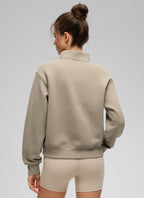 Women's funnel neck half-zip sweatshirt with long sleeves and ribbed trims