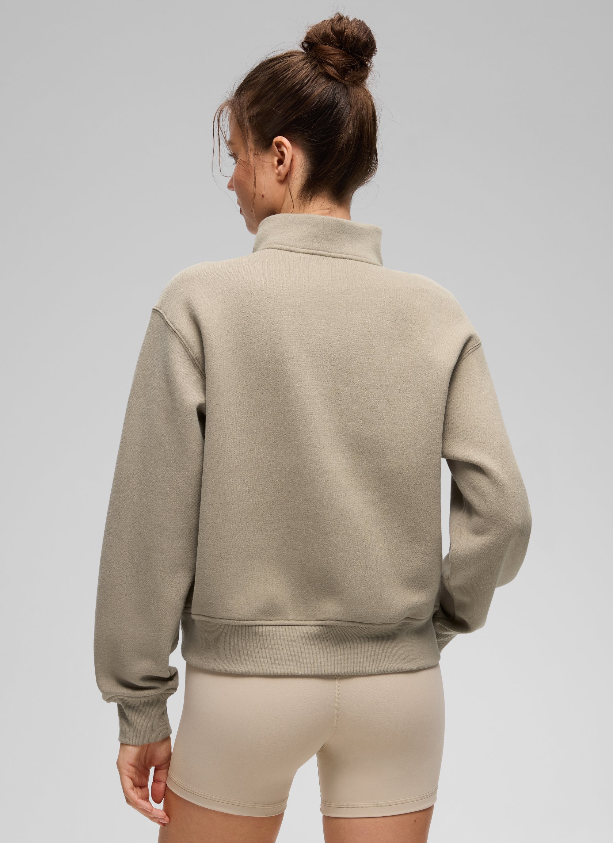 Women's funnel neck half-zip sweatshirt with long sleeves and ribbed trims