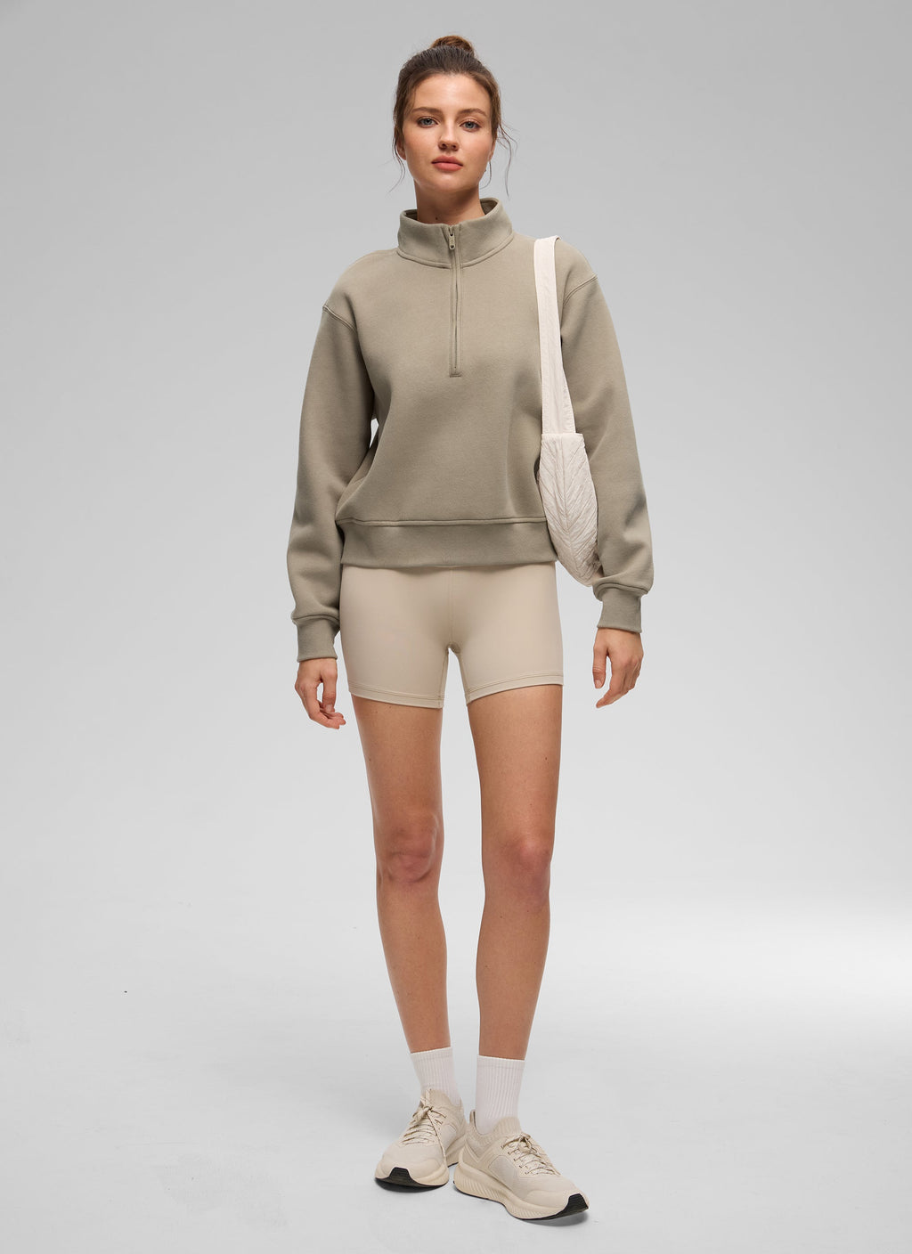 Women's funnel neck half-zip sweatshirt with long sleeves and ribbed trims