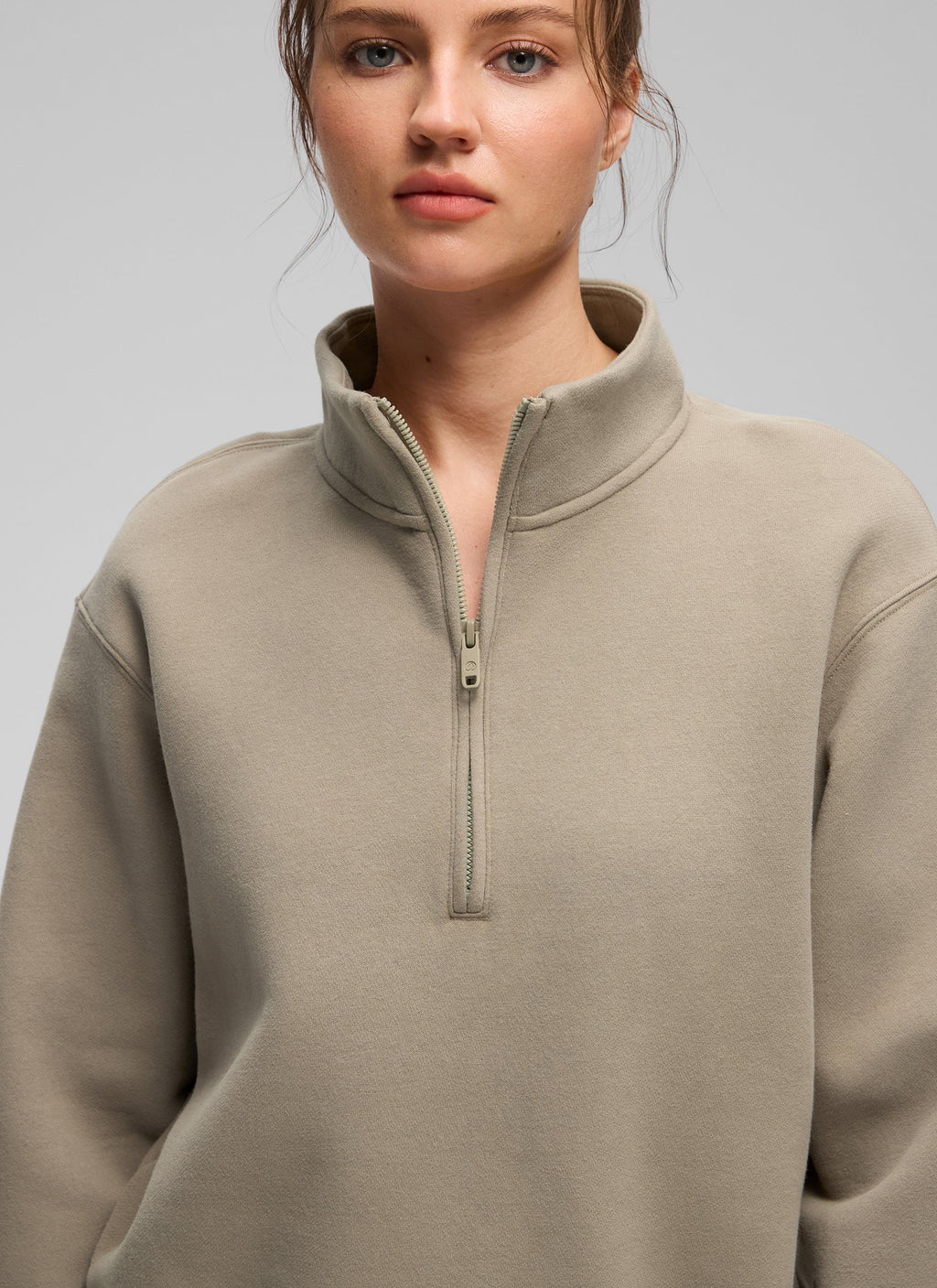 Women's funnel neck half-zip sweatshirt with long sleeves and ribbed trims