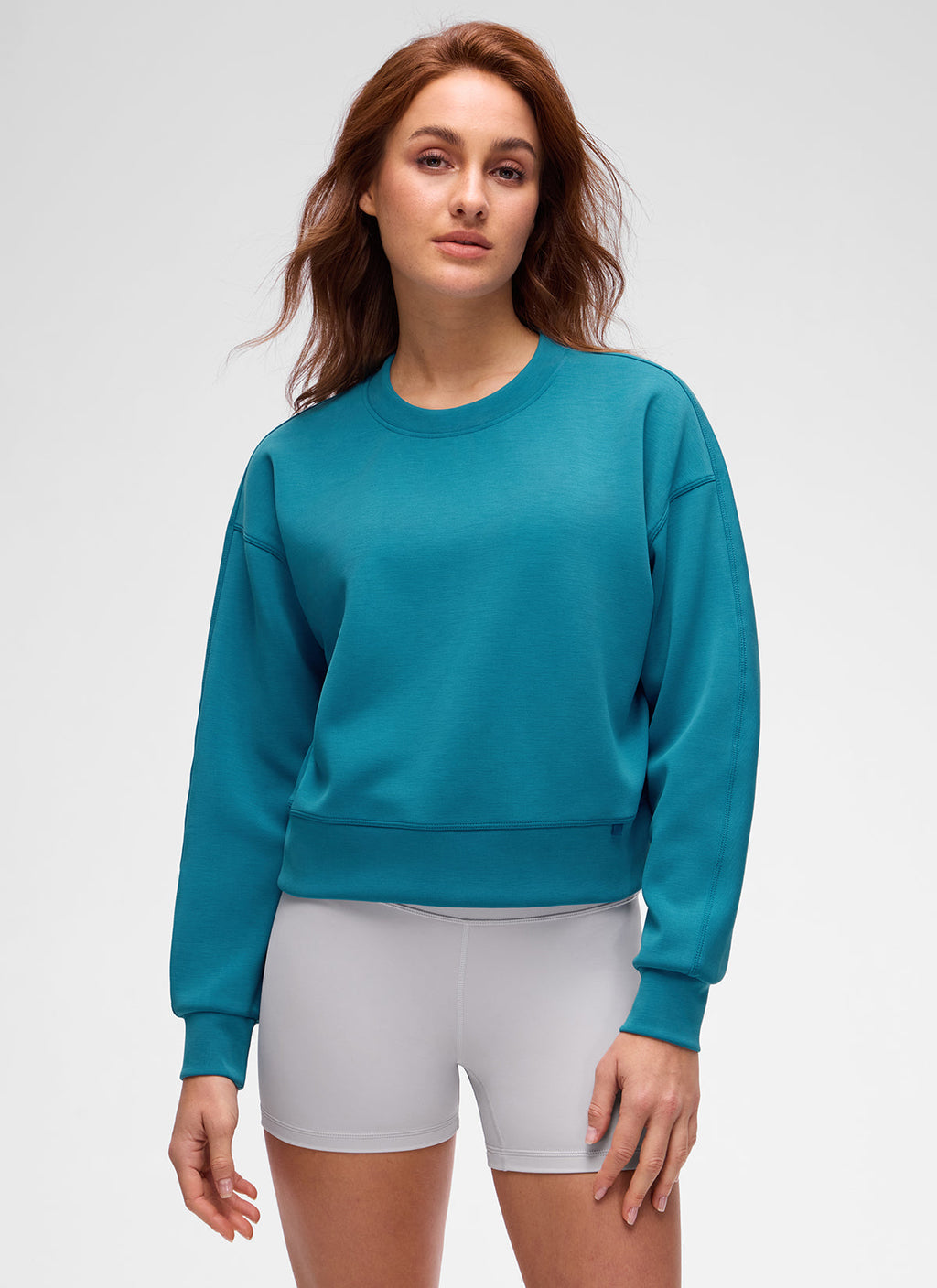 Women's plain crewneck sweatshirt with long sleeves and ribbed trims