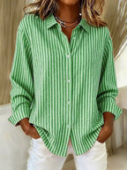 Women's striped button-down shirt with collared neckline and long sleeves