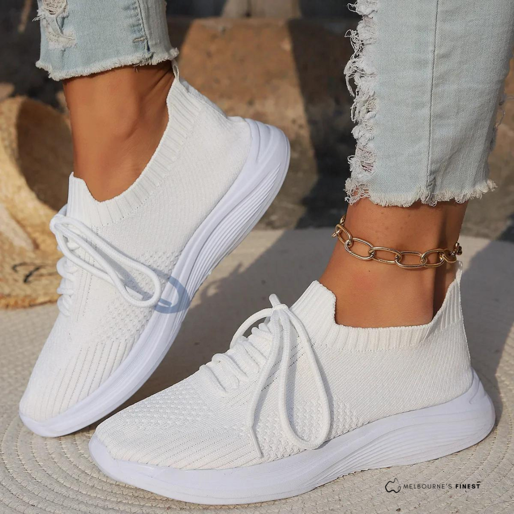 Women's knit lace-up sneakers with ribbed collars and raised textured soles