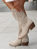 Perforated western ankle boots with pointed toes and block heels