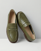 Women's penny loafers with apron stitching and low heel