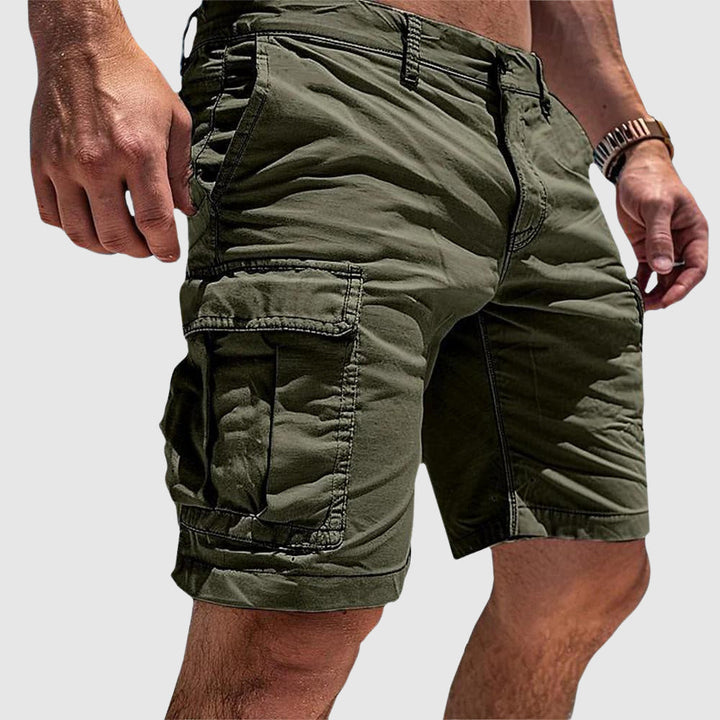 Men's knee-length cargo shorts with flap pockets and belt loops
