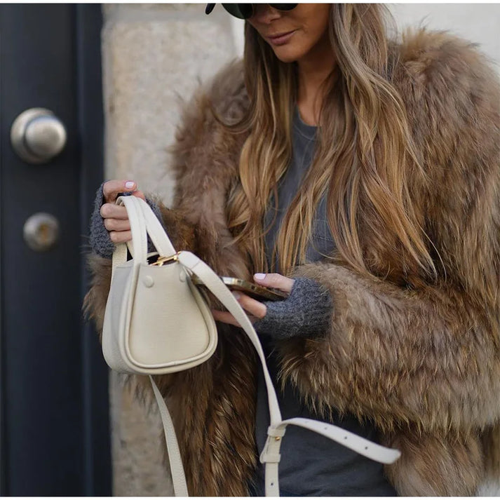 Women's brown faux fur jacket with a hooded collar