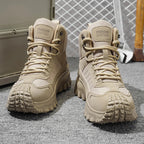Men's high-top running shoes with lace-up fronts and lugged soles