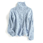 Women's textured cable knit turtleneck sweater with long sleeves