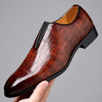 Men's glossy crocodile-effect slip-on loafers with a rounded toe and low block heel