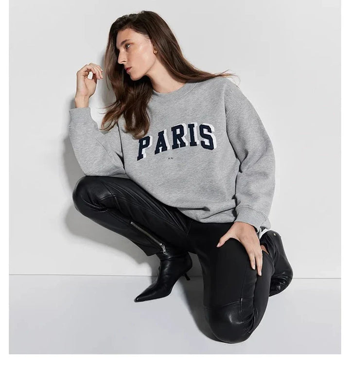 Women's crew-neck sweatshirt with long sleeves and embroidered front design
