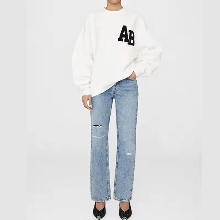 Women's crew-neck sweatshirt with long sleeves and embroidered front design