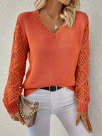 Women's V-neck knitted jumper with long openwork sleeves