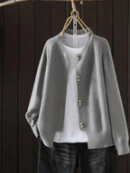 Women's ribbed knit cardigan with pearl-style buttons