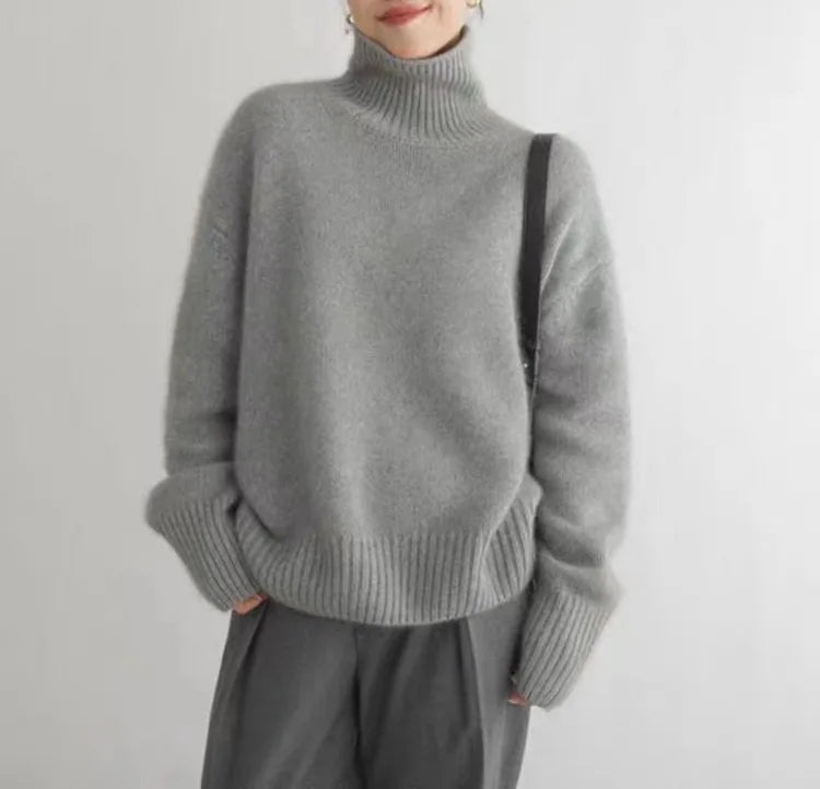 Women's cream turtleneck sweater with ribbed trims