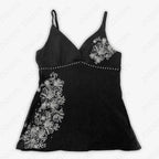 Black floral cami top with V-neckline and spaghetti straps