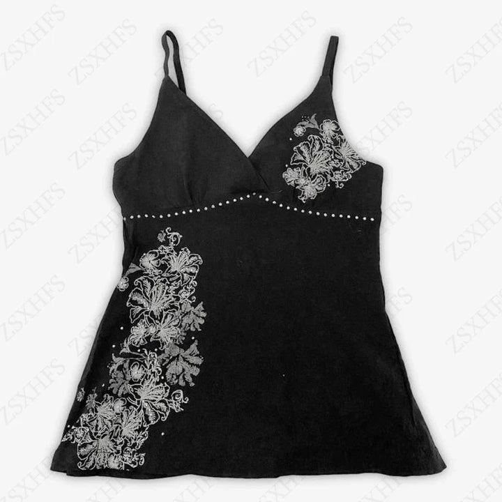 Black floral cami top with V-neckline and spaghetti straps