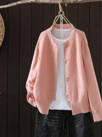 Women's ribbed knit cardigan with pearl-style buttons