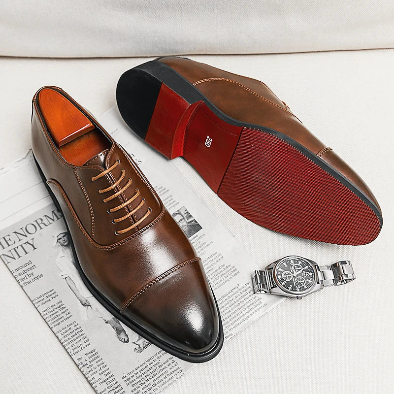 Men's cap toe Oxford shoes with lace-up front and low heel