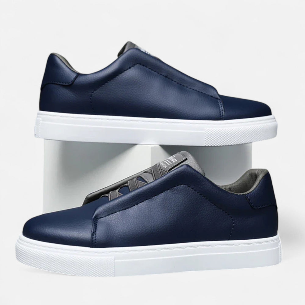 Men's low-top lace-up sneakers with panelled upper and flat white sole