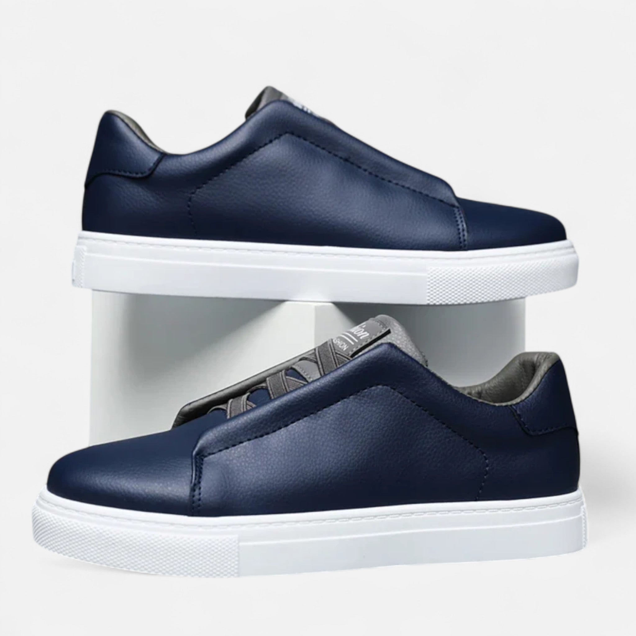 Men's low-top lace-up sneakers with panelled upper and flat white sole