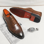 Men's cap toe Oxford shoes with lace-up front and low heel