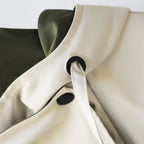 Women's hooded windbreaker jacket with contrast panels and drawstrings